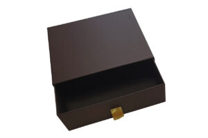 Drawer style rigid box with pull-out ribbon